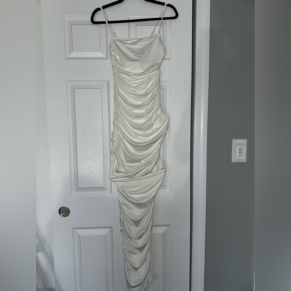 Maxi white ruched dress with side slit